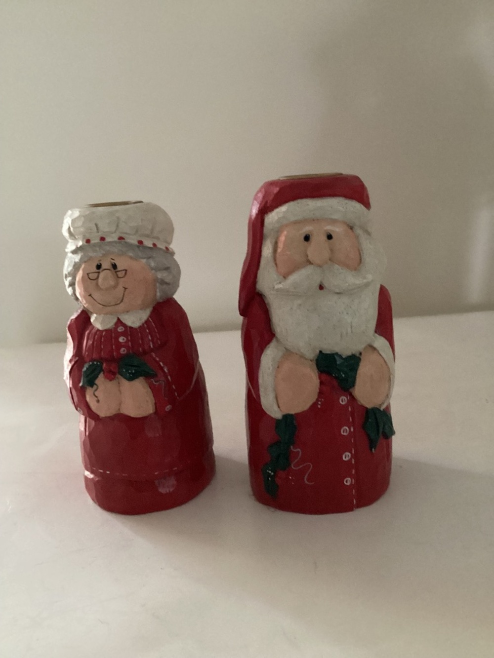 Resin Santa and Mrs. Claus Candlesticks in red and white 6 inches tall